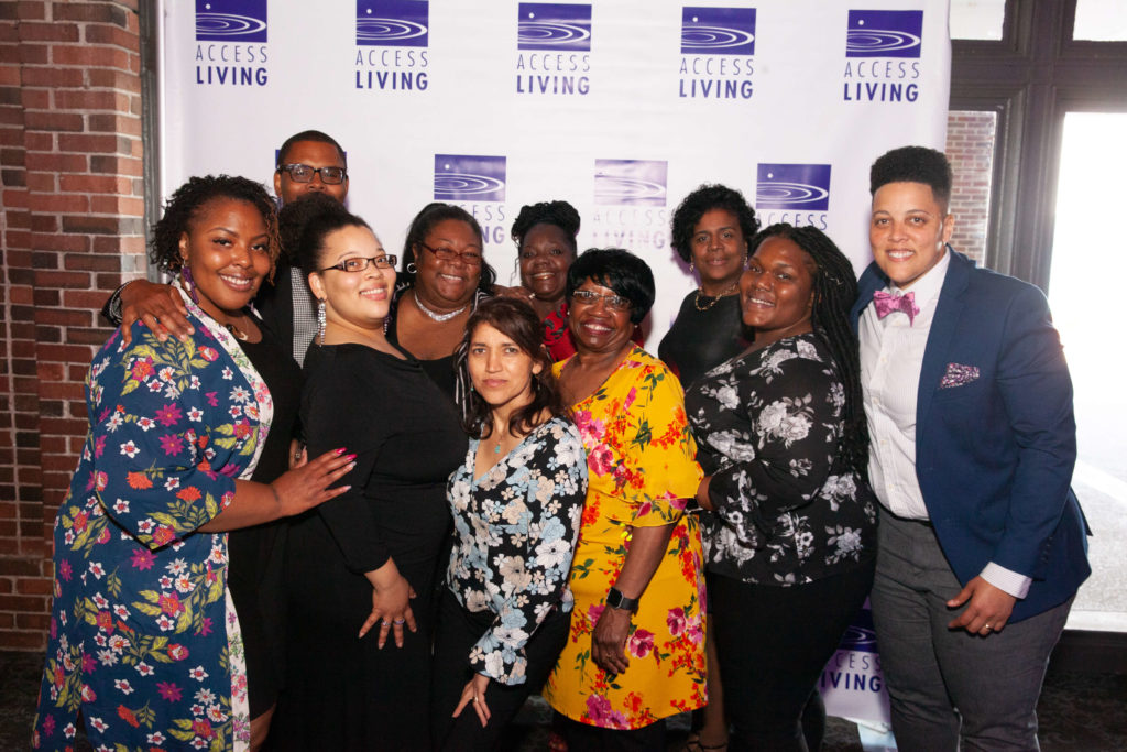 Guests pose for a group shot at Access Living's 2019 Gala. 