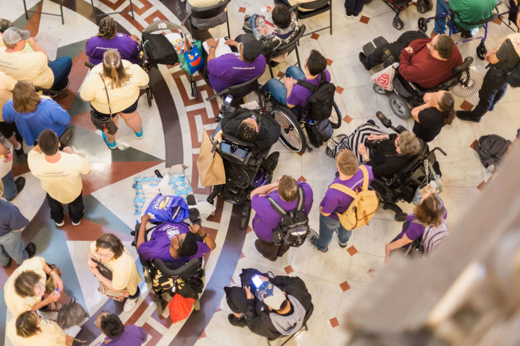 An aerial shot of Access Living staffers attending a rally in Springfield, Illinois.