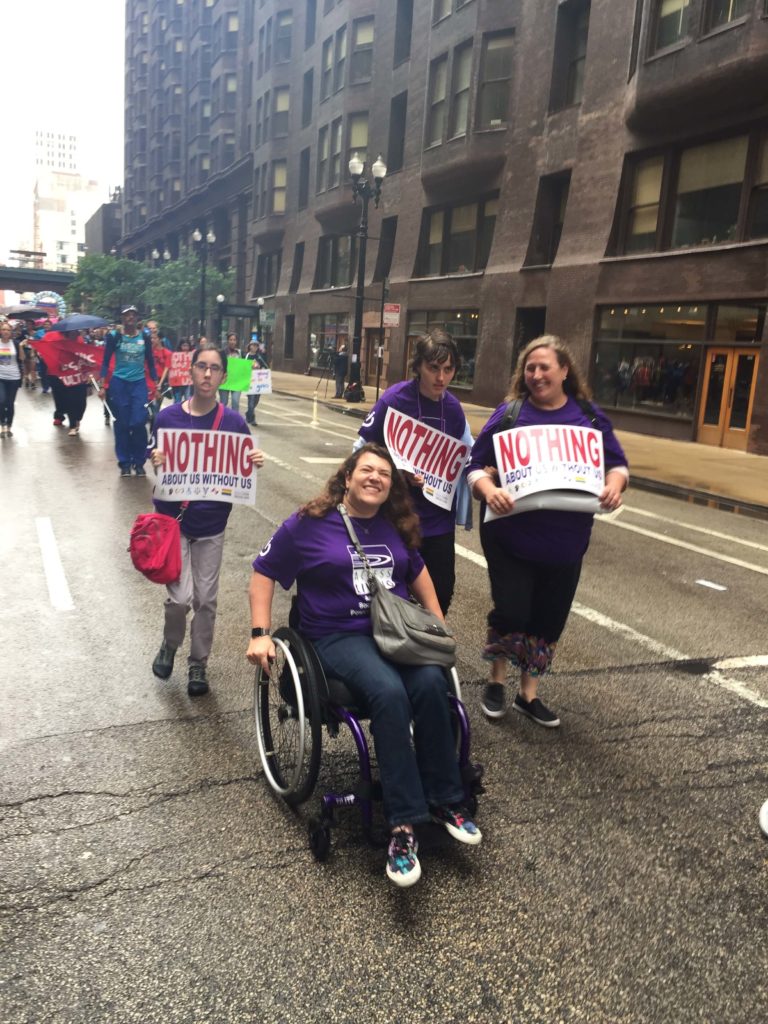 Access Living staff participating in the disability pride parade.