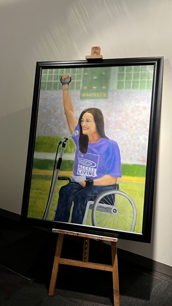 Painting of a woman in a wheelchair