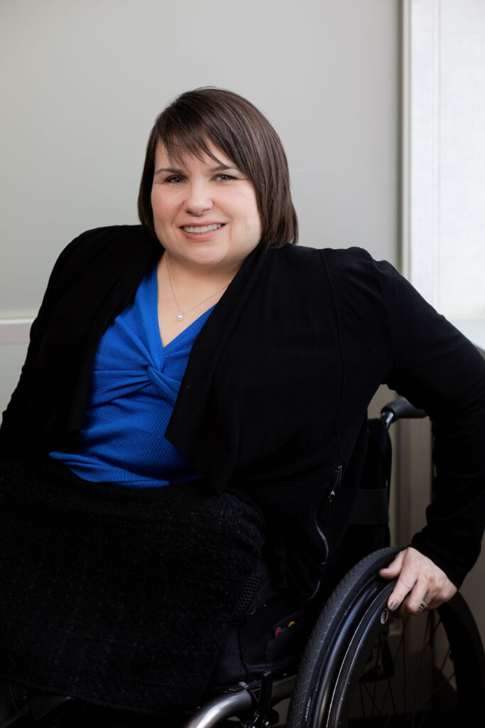 Karen Tamley, a white woman in a wheelchair