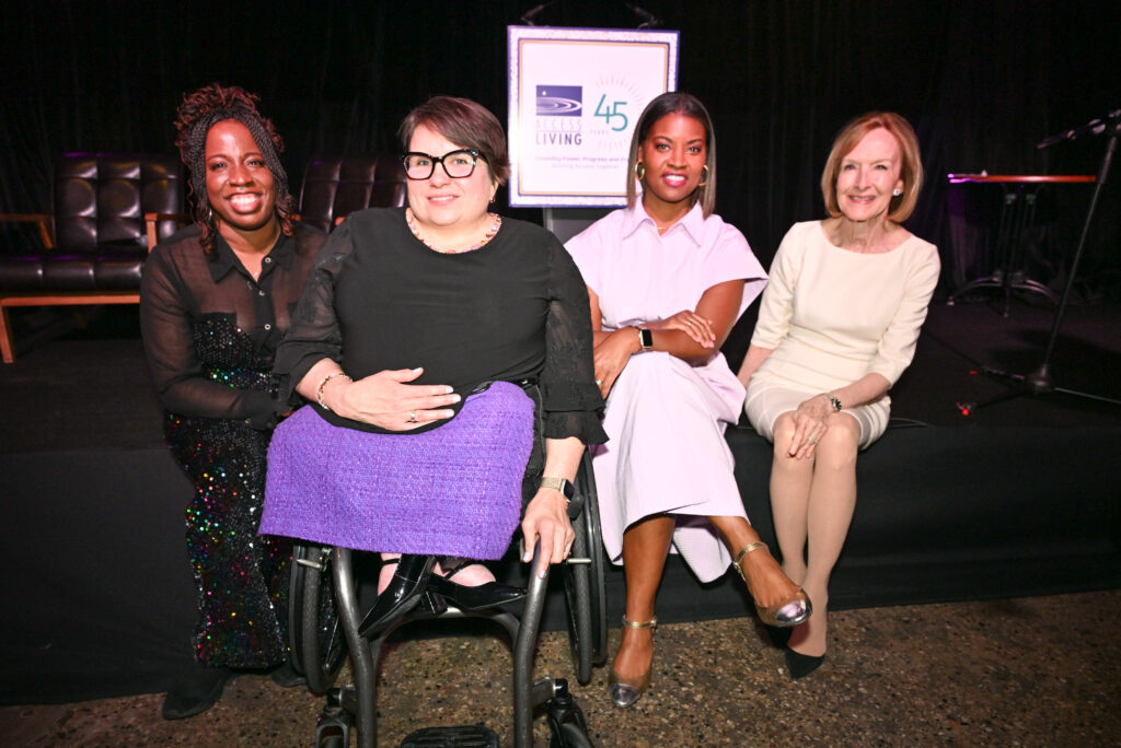 CEO Karen Tamley with emcee Brandis Friedman, Lifetime Achievement Award recipient Judy Woodruff